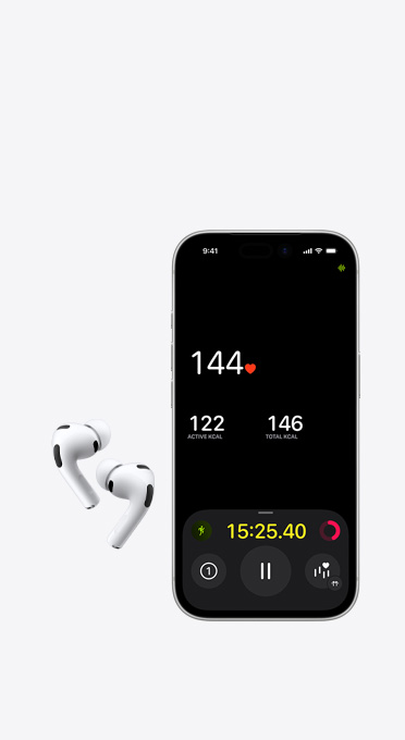 Vasak- ja parempoolne juhtmeta kõrvaklapp iPhone'i kõrval, mille ekraanil on kujutatud pulsi jälgimise monitori