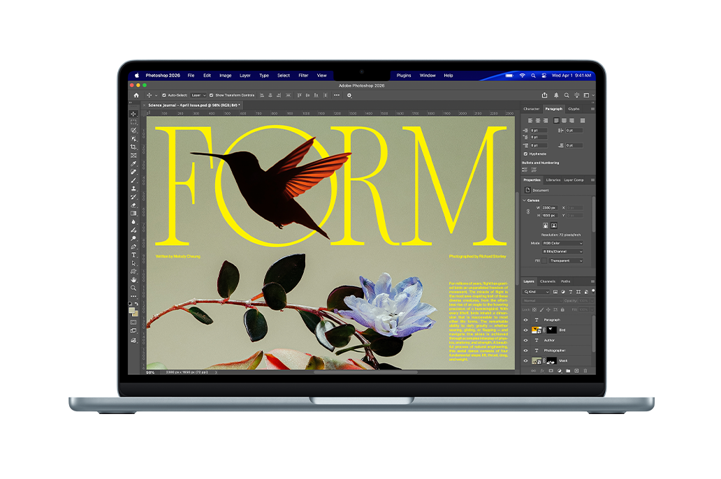 A science journal cover design is being created in Adobe Photoshop on a MacBook Air screen