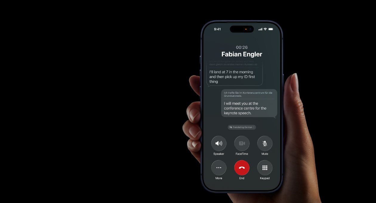A hand holds an iPhone 17 Pro, demonstrating the Apple Intelligence Live Translation feature during a phone call