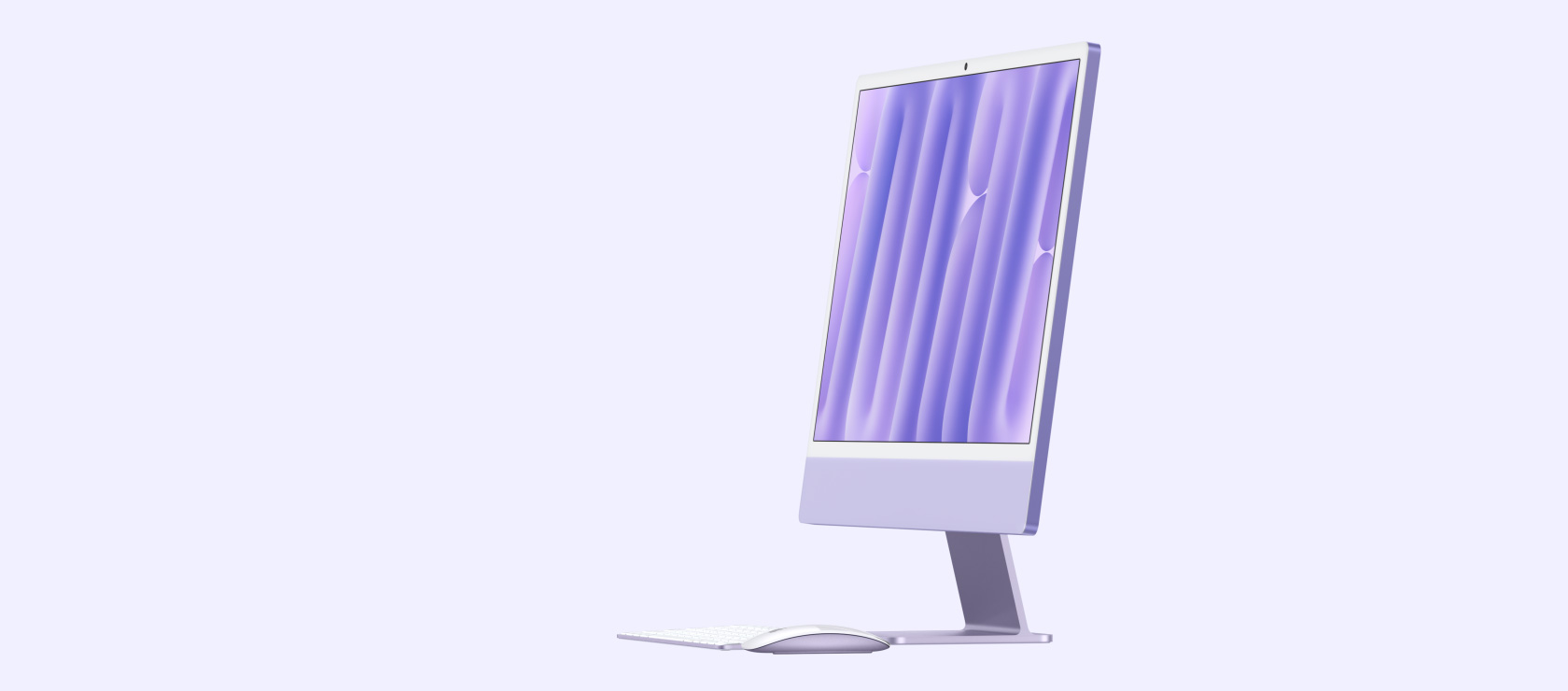 iMac morado con teclado y mouse